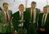 Kyle Dake (second from left) received the Hodge Trophy from WIN publisher Bryan Van Kley (second from right) and ASICS Neil Duncan (left) and Nick Gallo.