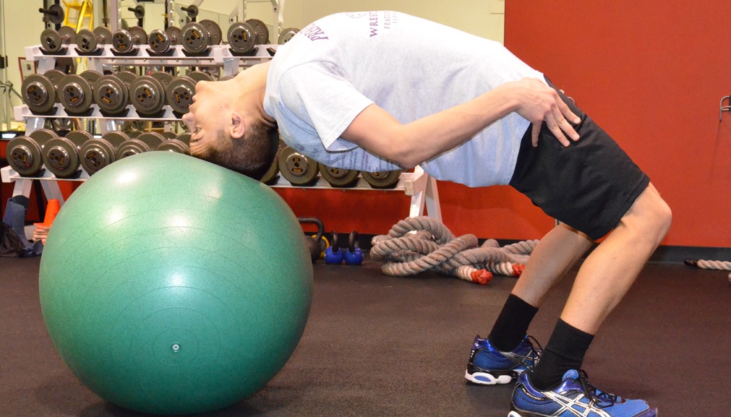 Training Technique of the Week Stability Ball Neck Bridges WIN Magazine Wrestling News